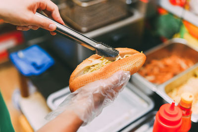 Close-up of person preparing food