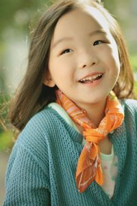 Close-up portrait of a smiling young woman