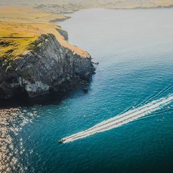 High angle view of rocks on sea