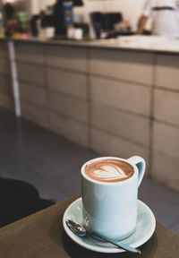 Coffee cup on table