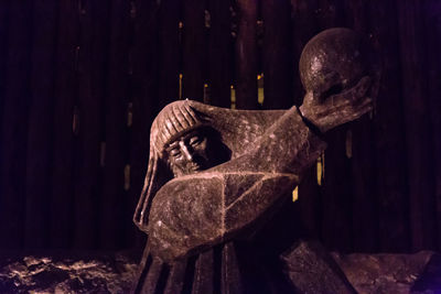 Close-up of statue against trees