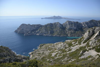 High angle view of calm blue sea against sky