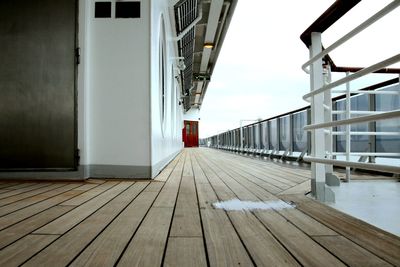 Surface level of empty footpath by buildings in city