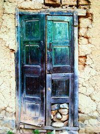 Closed wooden door of house