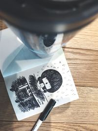 High angle view of paper on table