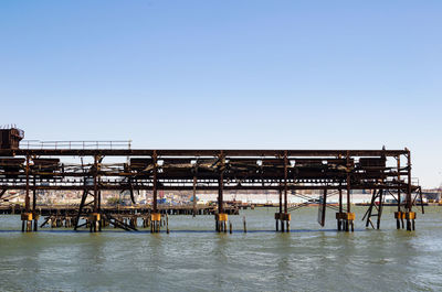 View of built structures against clear sky