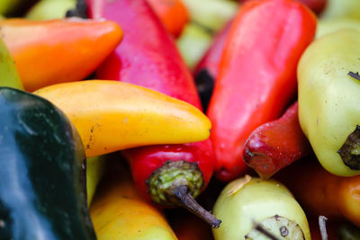 Full frame shot of various bell peppers at market stall