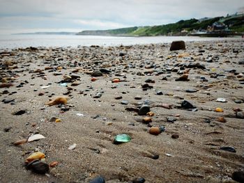 Surface level of stones on shore at beach