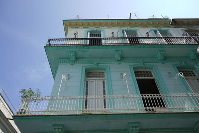 Low angle view of building against clear blue sky