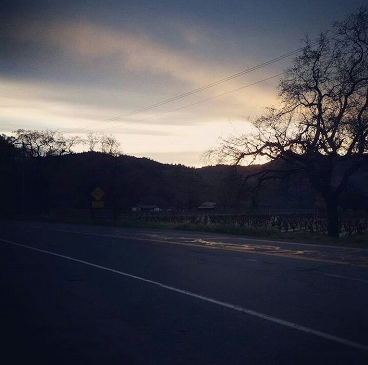 ROAD AGAINST SKY DURING SUNSET