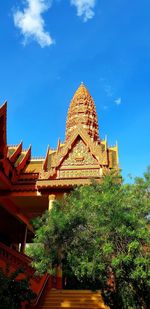 Low angle view of a temple against building