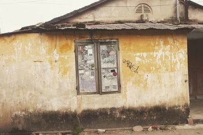 Graffiti on wall of old building