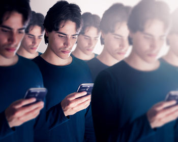 Young man using mobile phone