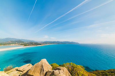 Scenic view of sea against blue sky