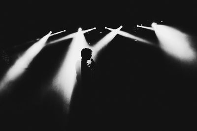 Close-up of illuminated lamp at night