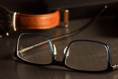 Close-up of sunglasses on table