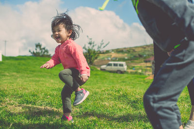 Boy playing on field