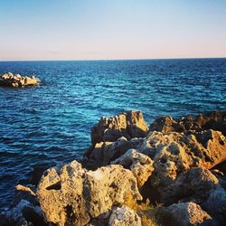 Scenic view of sea against clear sky