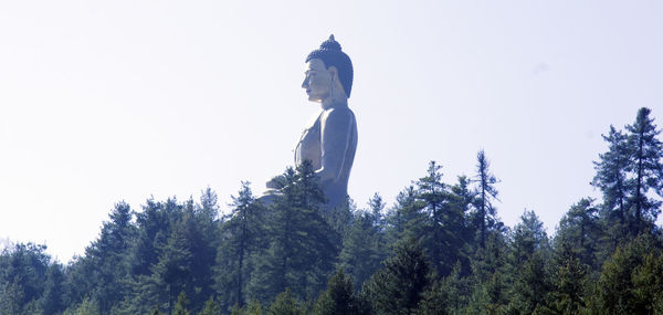 Low angle view of statue against clear sky