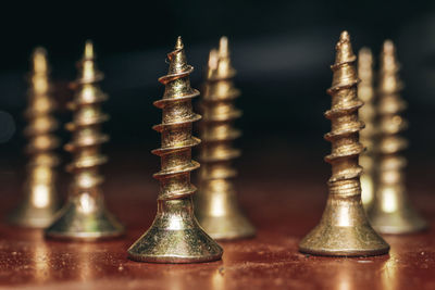 Close-up of metallic structure on table