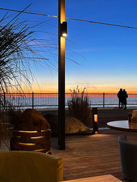 Scenic view of sea against clear sky during sunset