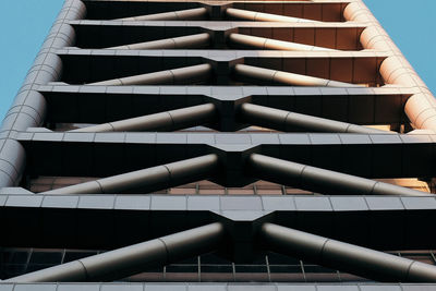 Low angle view of office building against clear sky