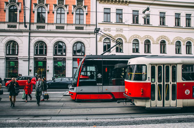 People walking on street in city