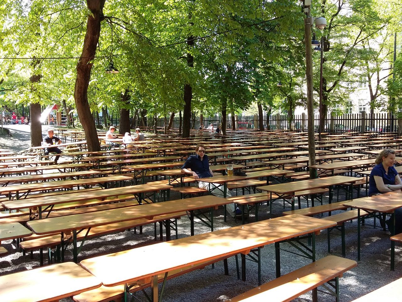 Waiting at the biergarten. · Munich München germany Augustiner August beer garden benches many benches Benches all around bench paradise summer Early Bird The Purist (no edit, no filter)
