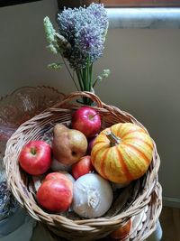 Close-up of apples in basket on table