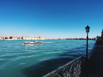 Venice city skyline and giudecca canal on a sunny day, clear and blue sky 