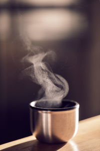 Close-up of tea cup on table