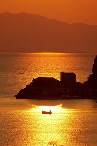 Scenic view of sunset over sea