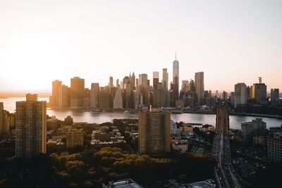 Modern buildings in city against clear sky