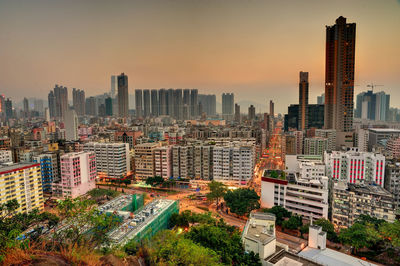 High angle view of city at sunset