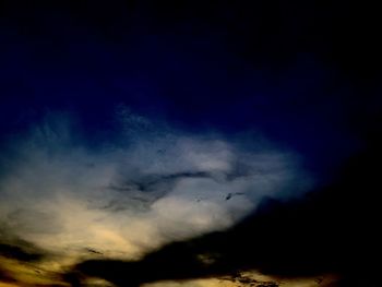 Low angle view of dramatic sky at sunset