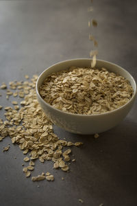 Close-up of oats in bowl on table