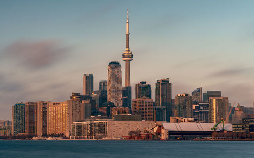 Modern buildings in city against sky