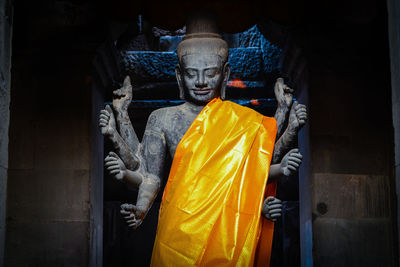 Statue of buddha outside building