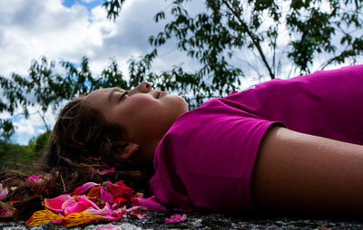 Girl in purple t-shirt dreaming