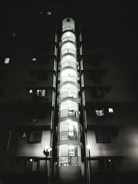 Low angle view of tower at night