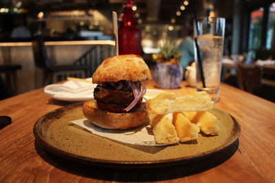 Close-up of burger on table in restaurant