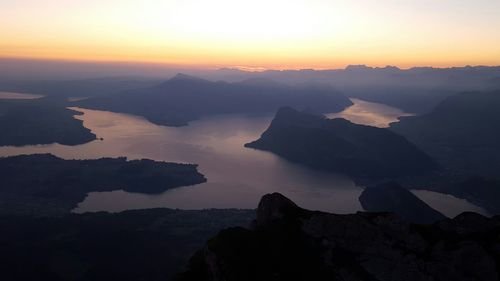 Scenic view of mountains at sunset