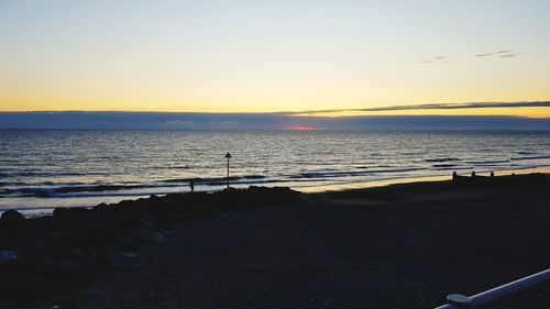 Scenic view of beach during sunset