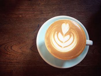 High angle view of cappuccino on table