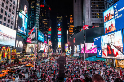 Crowd in city at night