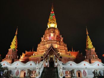 Low angle view of illuminated temple against sky at night