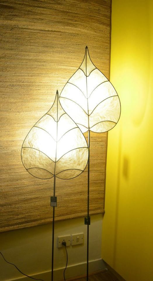 indoors, lighting equipment, hanging, yellow, illuminated, built structure, wall - building feature, electric lamp, home interior, wood - material, architecture, closed, decoration, no people, door, ceiling, close-up, protection, pattern, electricity