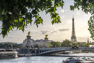 Arch bridge over river in city