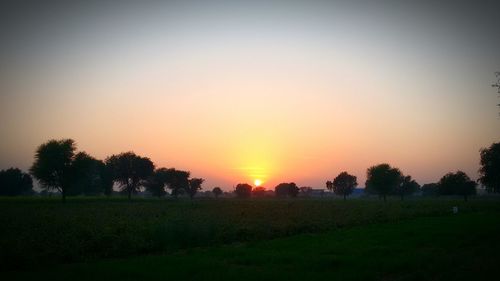 Scenic view of landscape at sunset