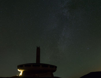 Low angle view of building against sky at night